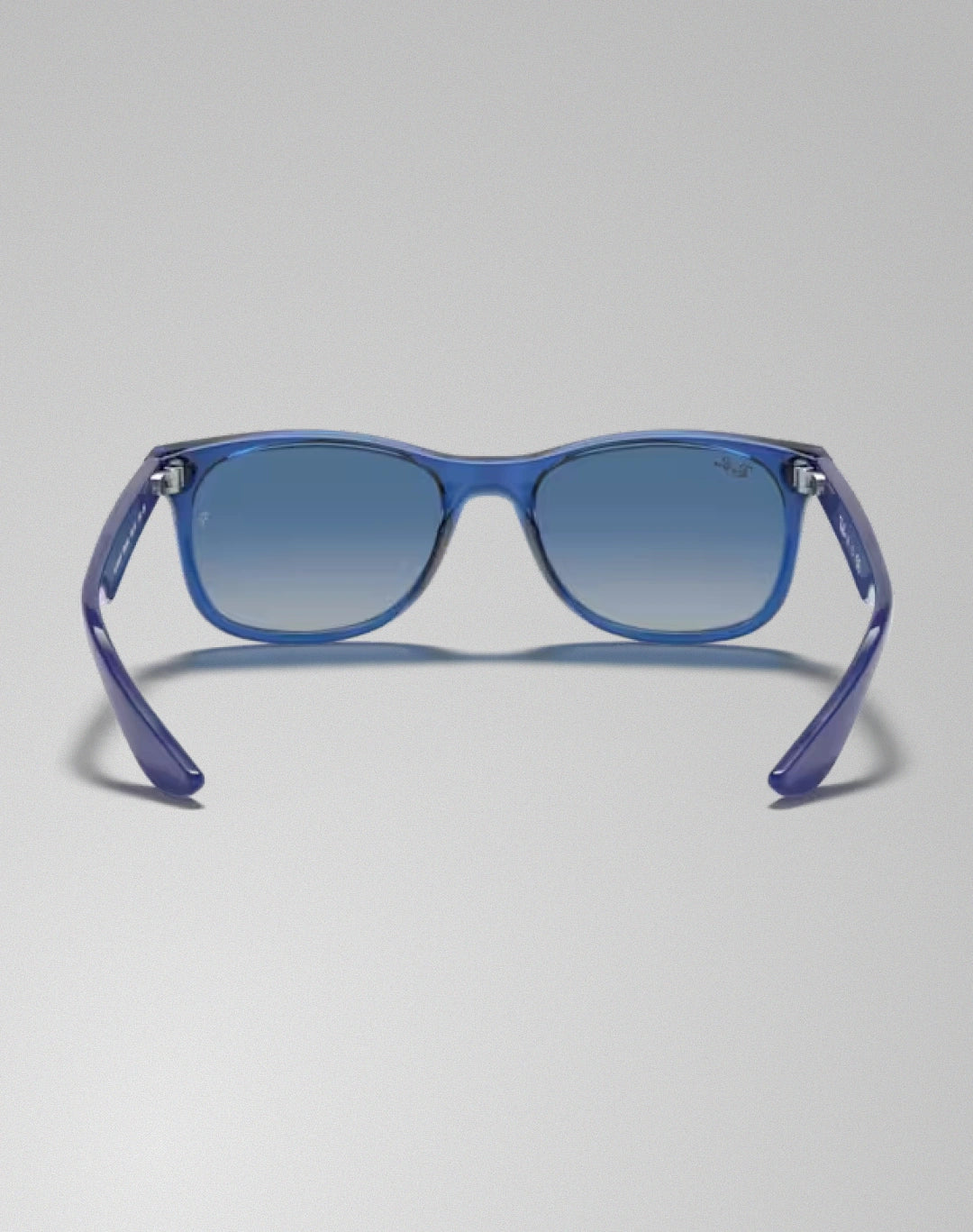 Ray-Ban 0RJ9052S-70624L – Lunettes de soleil carré transparent bleu