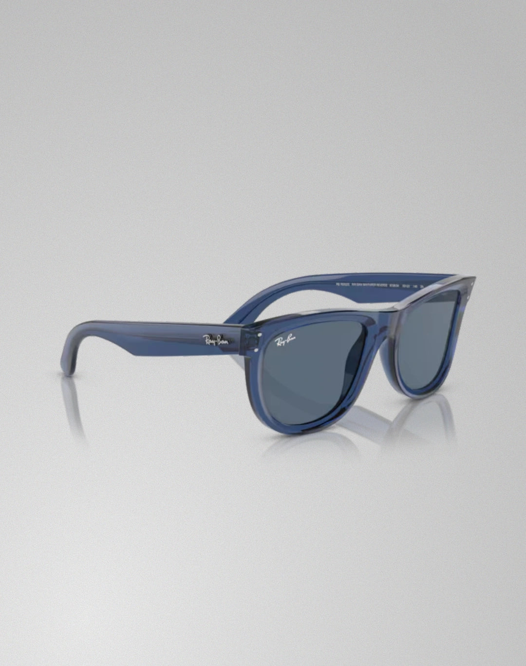 Ray-Ban 0RB0502S-67083A – Lunettes de soleil carré bleu marine transparent