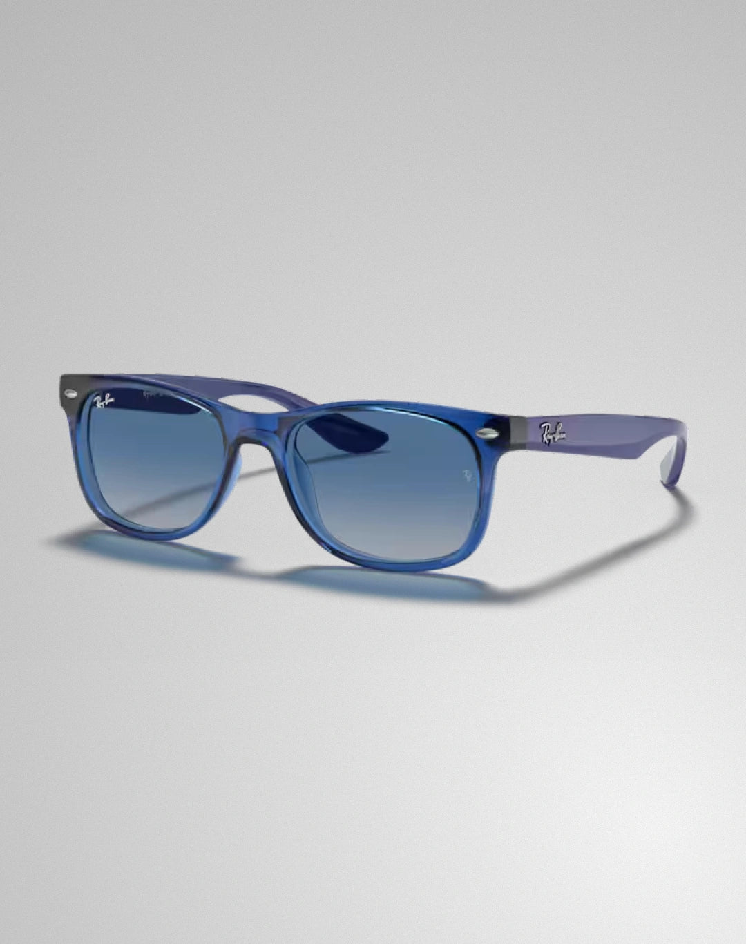 Ray-Ban 0RJ9052S-70624L – Lunettes de soleil carré transparent bleu